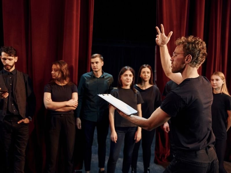 Picture related to acting techniques https://showcaseschool.co/wp-content/uploads/2023/09/theater-entertainment-plays-musicals-acting-techniques-stage-design-lighting-sound-theater-enthusiasts-community-Entertainment-–-Competes-TV-website-theater-entertainment-81aeb307.jpg